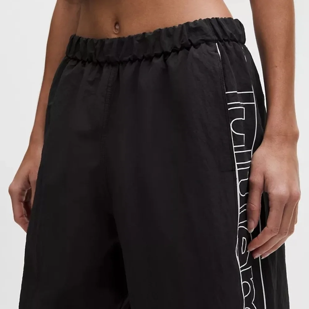 NWT Lululemon Crinkle Nylon Mid-Rise Track Pant
Wordmark - Picture 3 of 8